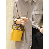 Bucket bag Cross pattern cowhide women's bag Niche design bag 2021 new early spring tide women's handbag women